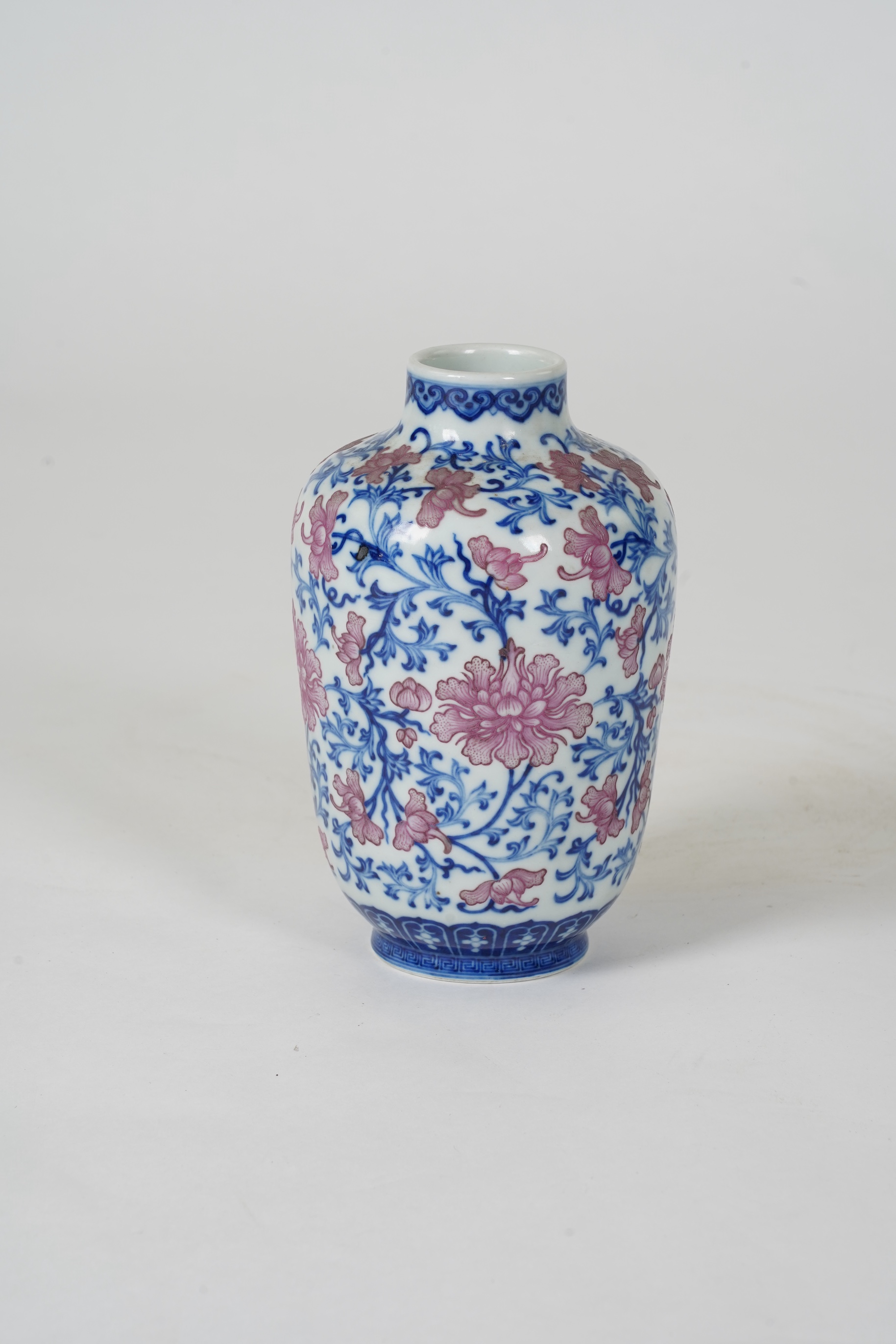 A Chinese pink enamelled and underglaze blue vase, six character Qianlong seal mark to base, possibly Republic period